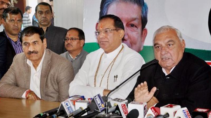 Former Haryana CM and Congress leader Bhupinder Singh Hooda addresses a press conference at the party office in Dehradun. (Photo: AP)