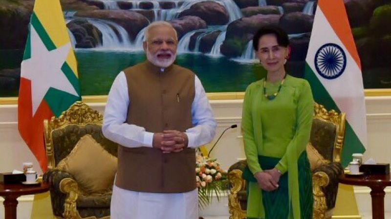 Prime Minister Narendra Modi with the State Councillor Aung San Suu Kyi in Maynmar (Photo: MEA Twitter)