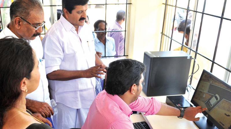 Transport minister A.K. Saseendran during the inauguration of the automated driving test yard at Muttathara on Thursday. MLA V. S. Sivakumar looks on. (Photo: DC)