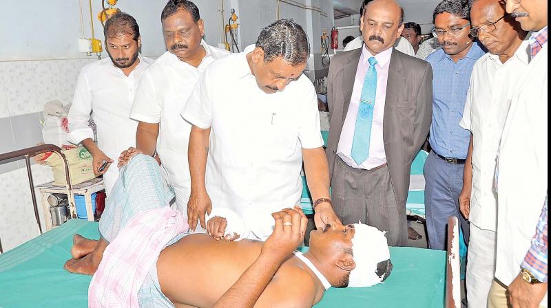 Handloom and textile minister  O. S. Manian  visits injured fishermen (Photo: DC)