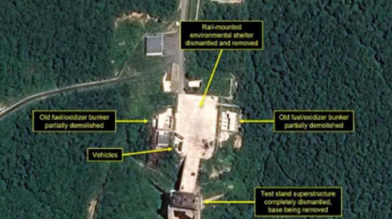 According to the respected 38 North group, commercial satellite imagery of the Sohae satellite launching station indicates Pyongyang has begun taking down a processing building and a rocket-engine test stand that had been used to test liquid-fuel engines for ballistic missiles and space launch vehicles. (Photo: AFP)
