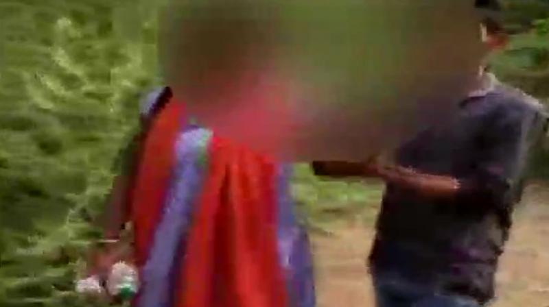In the six-minute video, the girl can be heard screaming when men try to drag her into the forest and gag her. (Photo: Twitter | ANI)