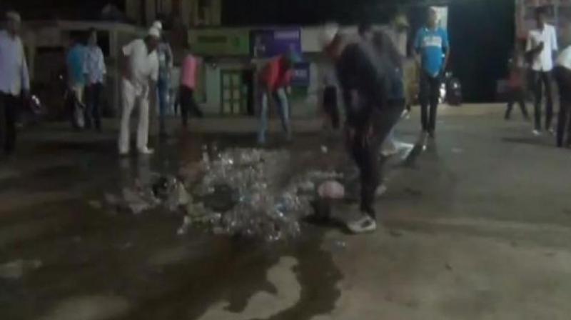 A group of volunteers was seen cleaning the streets of Baripada after the commencement of the Bahuda Yatra or return car festival of Lord Jagannath. (Photo: ANI)