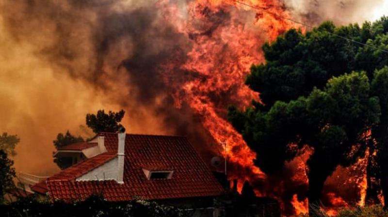 The fire in Mati village, some 29 km east of Athens, was by far the countrys worst since blazes devastated the southern Peloponnese peninsula in August 2007. (Photo: AFP)