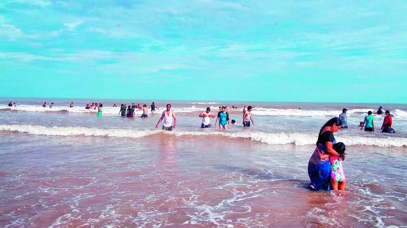 The absence of barricades, caution boards, life jackets and other safety measures poses a threat to the public at Suryalanka beach in Guntur district. (Photo: DC)