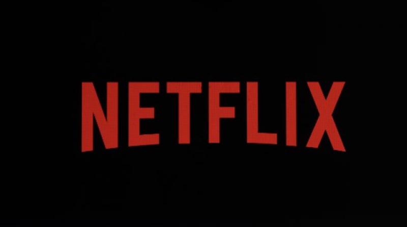 Netflix logo on an iPhone in Philadelphia. Netflix, Inc. reports earnings Monday, July 16, 2018. (AP Photo/Matt Rourke, File)