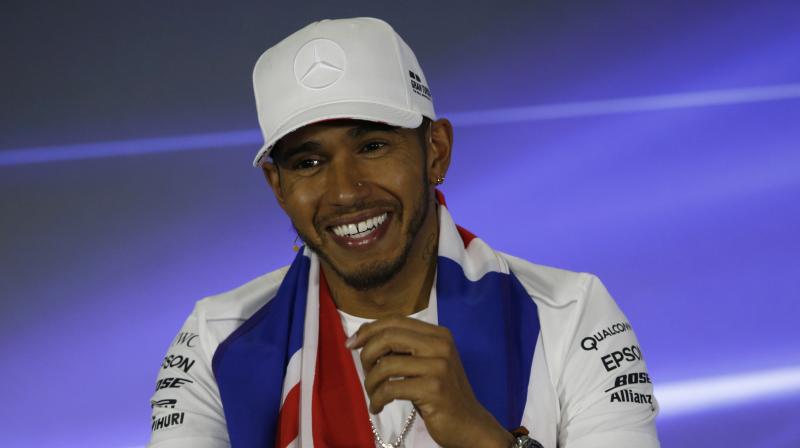 Lewis Hamilton said he was motivated by his battle with Sebastien Vettel. (Photo: AP)