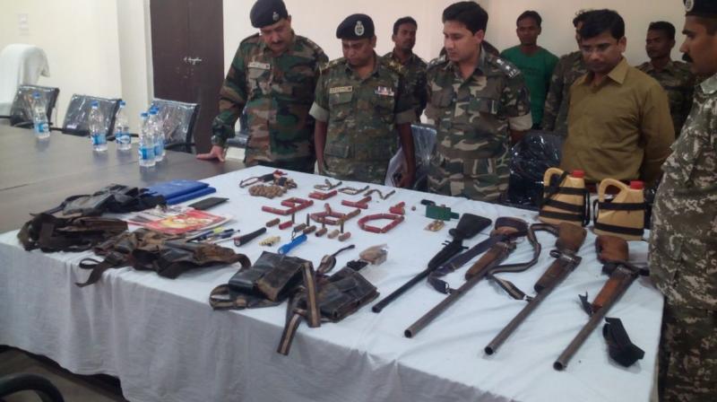 Arms and ammunition recovered from naxals (Photo: ANI Twitter)
