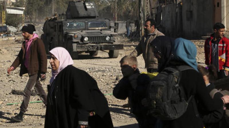 The officers say the troops entered the university grounds on Friday morning and secured parts of the compound, located in eastern half of Mosul. (Photo: AP)