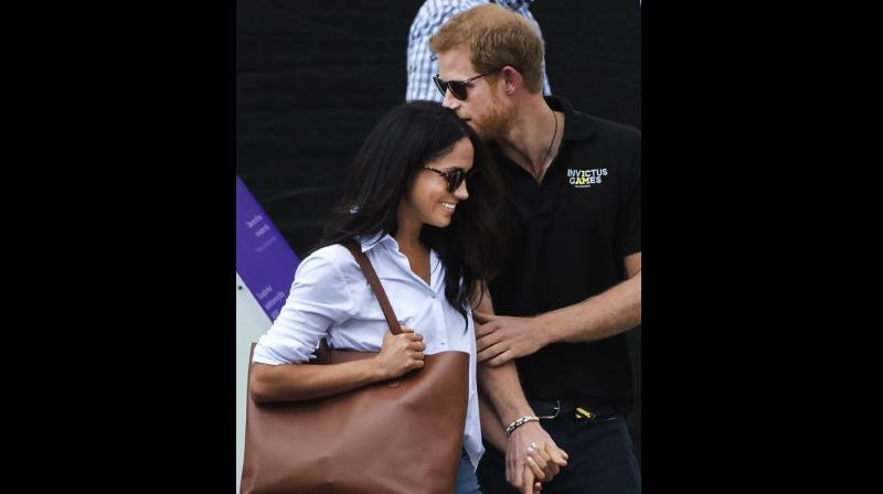 Prince Harry snapped with his girlfriend Meghan Markle (Photo: AP)