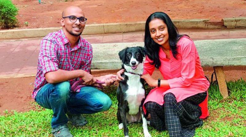 Harini and Praveen Vemuri with their dog Kookie