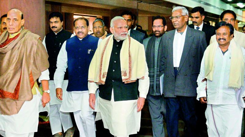 Prime Minister Narendra Modi with parliamentary affairs minister Ananth Kumar and home minister Rajnath Singh leaves after an all-party meeting ahead of the Budget session at Parliament House in New Delhi on Monday. (Photo: PTI)