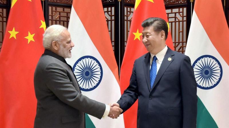 Prime Minister Narendra Modi and Chinas President Xi Jinping during a meeting on the sidelines of the Brics Summit in Xiamen on Tuesday. (Photo: PTI)