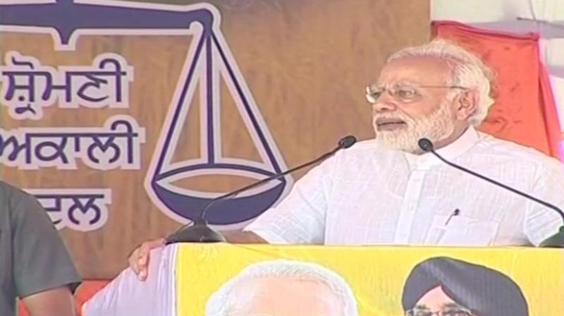 Prime Minister Narendra Modi said despite toiling hard, farmers could not think of a comfortable life and that they had to live a life of despair and despondency for decades because of the policies of the Congress-led governments. (Photo: Twitter | ANI)