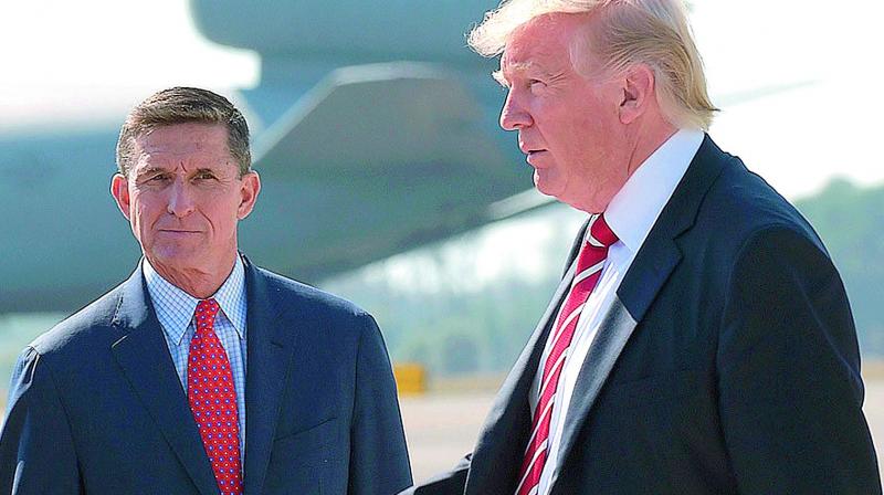 President Donald Trump with Michael Flynn.