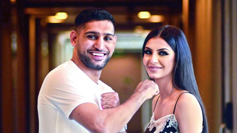 Amir Khan with his wife at an event in Mumbai. (Photo: DC)