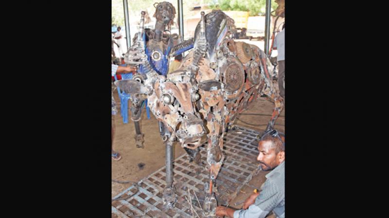 A jallikattu bull and a tamer statues are being fabricated from steel and metallic scrap.	(Photo: DC)