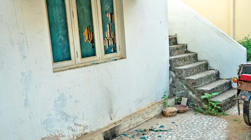 Unidentified persons allegedly hurled six petrol bombs at a BJP functionary house at Devakottai. (Photo: DC)