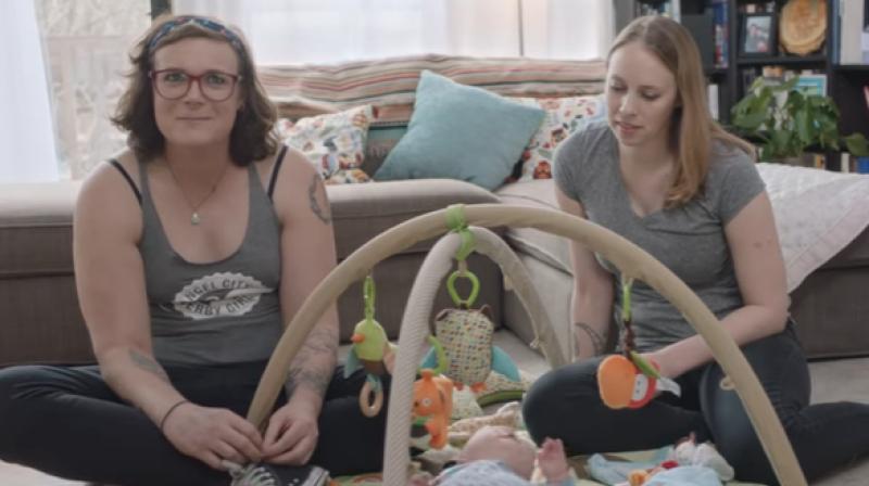 Shea, a grad student is one of the many in the advertisement who tells people that both she and her partners are mothers to the child. (Photo: Youtube)