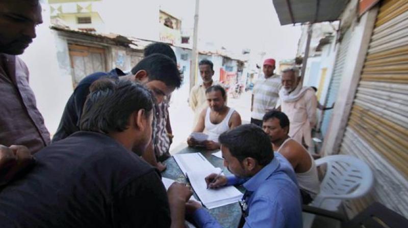 Officials during the Intensive Household Survey being conducted by the Telangana government in Hyderabad (Photo: PTI/File)