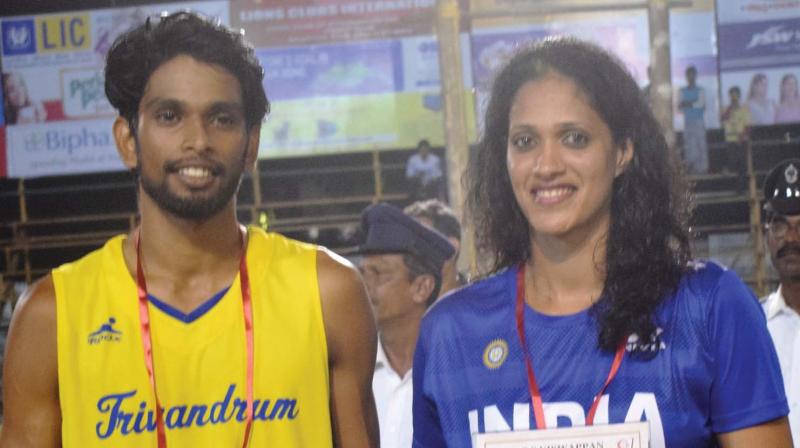 Jishnu Nair (left) and Stephy Nixon with the Best Player prizes of senior state  basketball  championship
