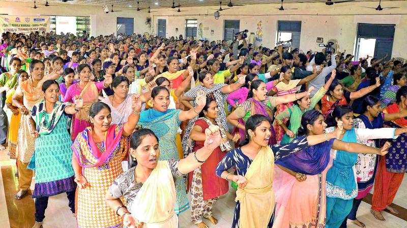 Women and girls demonstrate their newly-acquired martial arts skills on the concluding day of the self-defence training programme at a school in Vijayawada on Friday.  (Deccan chronicle)