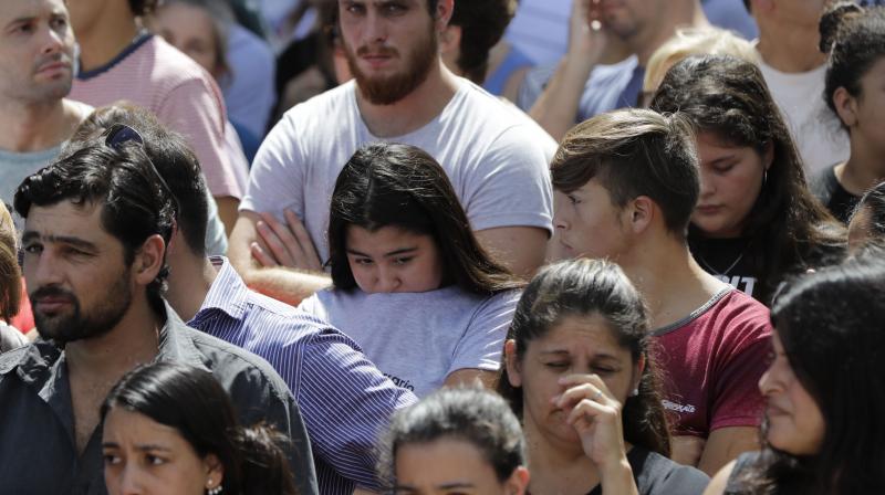 Through the morning, mourners gathered for a public vigil in a gymnasium in Progreso, the small farming town in Santa Fe province which Sala left as a teenager to play in Europe. (Photo: AP)