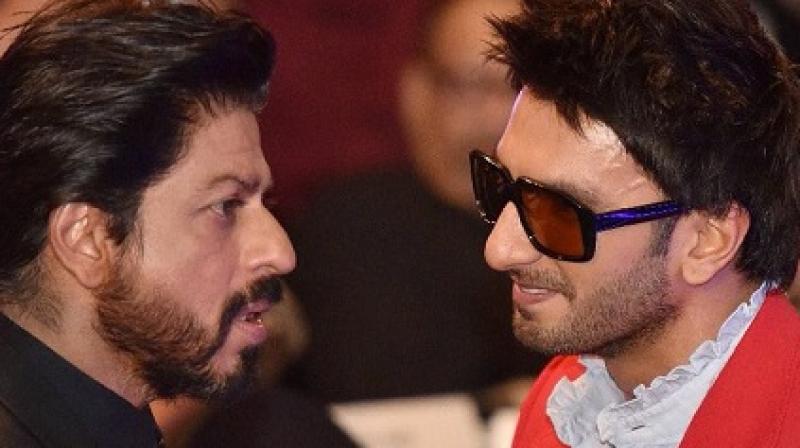 Shah Rukh Khan and Ranveer Singh at an event.