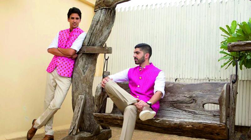 Models showcasing menswear in bright pinks    Project Bandi