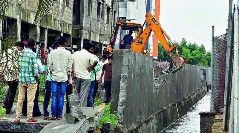 The GHMC is saving the big guns by calling for re-surveys if the encroachments are by politicos and big builders. (Representational image)