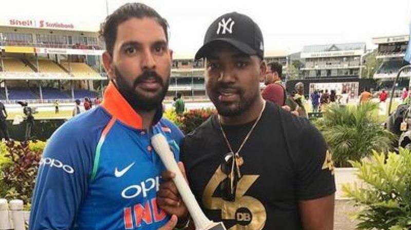 West Indies vs India: Yuvraj Singh gifts YouWeCan bat to Darren Bravo