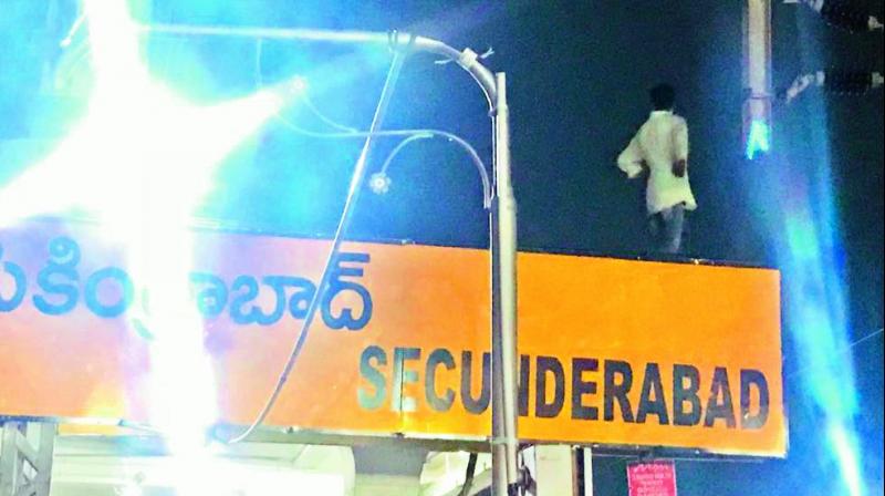 Sunil Kumar, 20, who climbed atop a train and threatened to touch a high voltage 25,000 KV wire at Secunderabad Railway Station on Saturday.