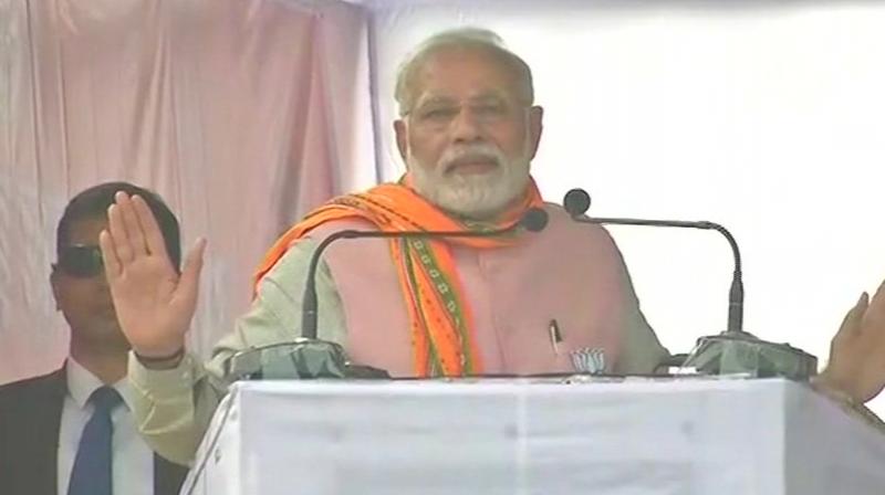 Taking the occasion to hit out at the Manik Sarkar-led state government, Prime Minister Modi said the people of the landlocked state have been deprived of their rights. (Photo: ANI/Twitter)