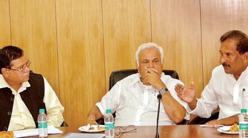 Bengaluru Development Minister K.J. George (right) held a  meeting regarding suburban railway project on Thursday (Photo: DC)