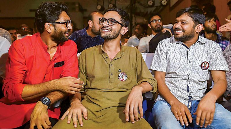 Gujarat MLA Jignesh Mevani (from L), JNU student leader Umar Khalid and JNU Students Union former president Kanhaiya Kumar during the Freedom of Expression meet organised on the occasion of the first death anniversary of journalist Gauri Lankesh, in Bengaluru on Wednesday. (Photo:PTI)