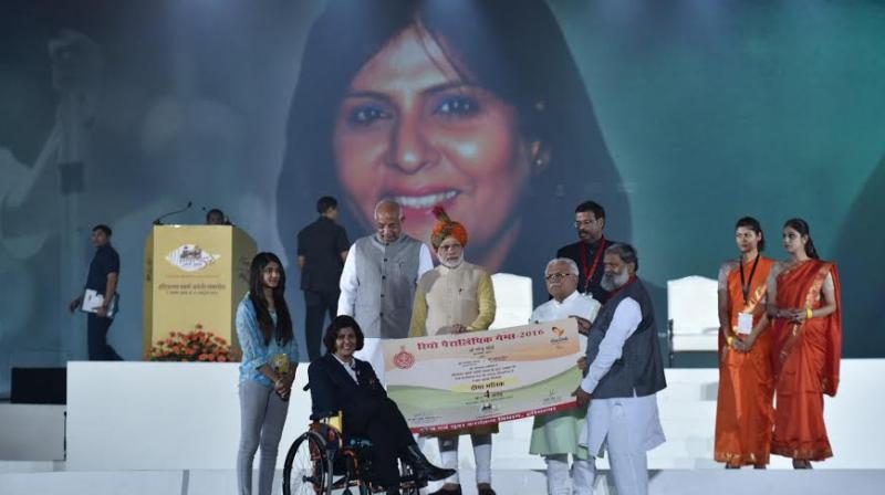 Narendra Modi handed over the cheque to Malik in the presence of Khattar and Haryanas Sports and Youth Affairs Minister Anil Vij. (Photo: Twitter/PIB)