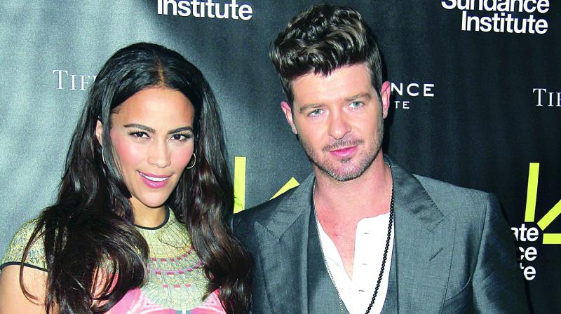 Robin Thicke and Paula Patton