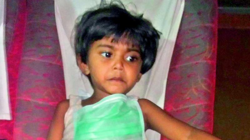 Eight-year-old Sirisha suffering with heart infection.
