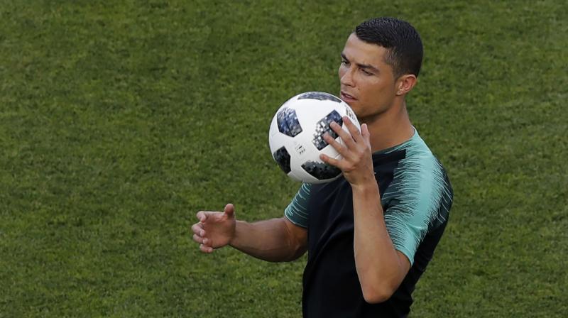 Ronaldo is unlikely to serve any time in jail under the deal because Spanish law states that a sentence of under two years for a first offence can be served on probation. (Photo: AP)