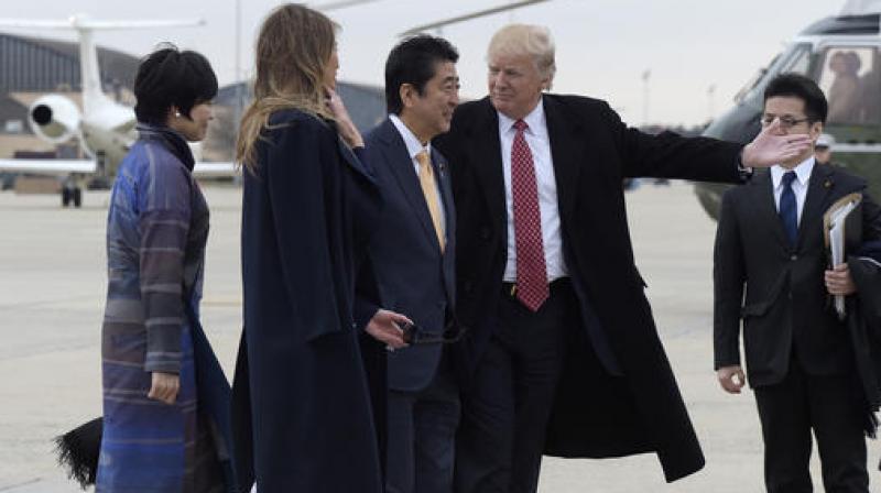 President Donald Trump and Japanese Prime Minister Shinzo Abe, accompanied by their wive, first lady Melania Trump and Akie Abe, prepares top board Air Force One at Andrews Air Force Base. (Photo: AP)