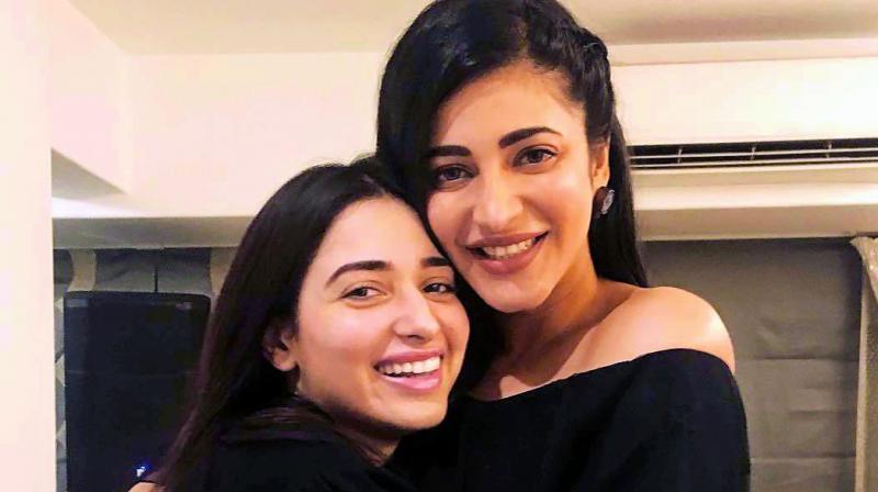 Everybody knows that Tamannaah and Shruti Haasan are good friends.  (Photo: DC)