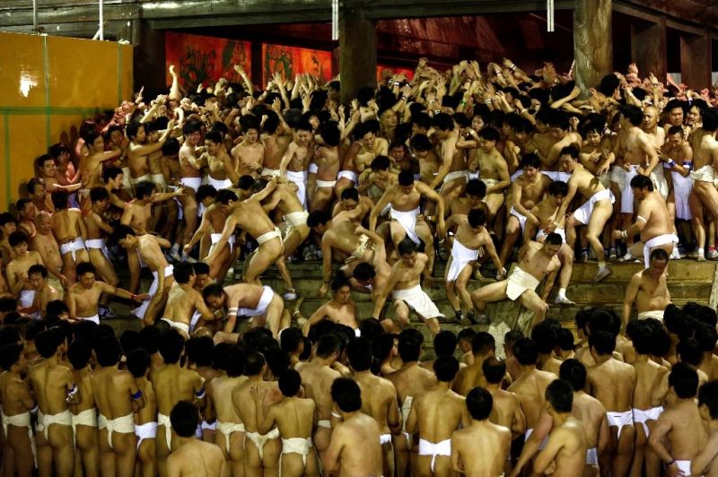 Bare cheek as Japanese men strip off for naked festival